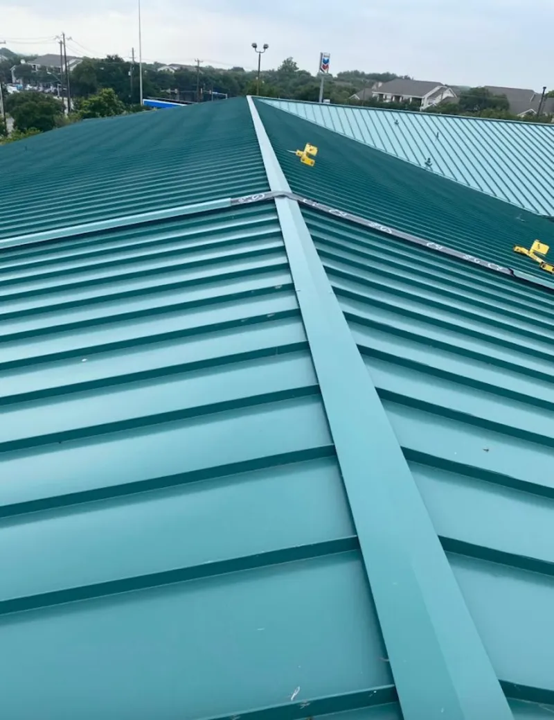 Green commercial metal roof ridge and valley for Metal Roof Repair in Gulfport